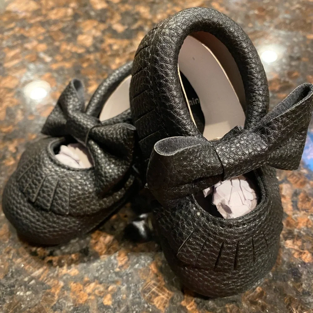 Baby Girl moccasins. Brand new ! Size 12